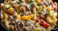 Philly cheesesteak Mac & Cheese + Collard Greens